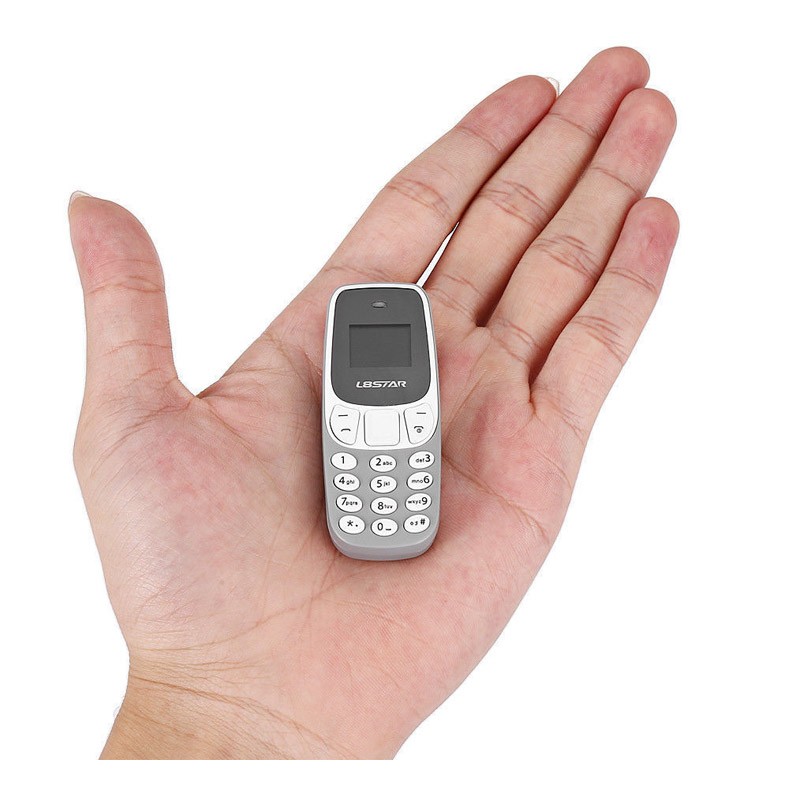 29.9 - Ultra Mini Δίκαρτο Κινητό Τηλέφωνο με Bluetooth και MP3 Player Χρώματος Γκρι
